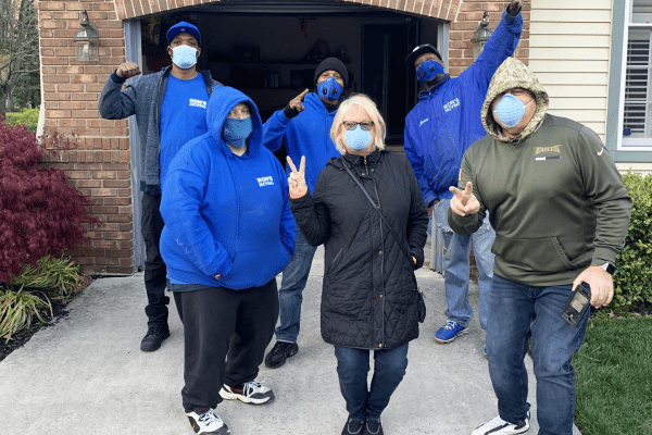 Ron's Moving Company employees with another satisfied family in South Jersey